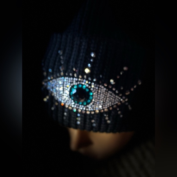 Black Beanie with Eye Design by Kurt Geiger.
NWOT - Picture 17 of 17